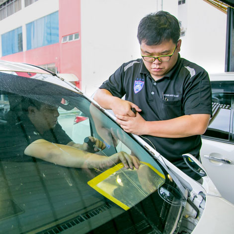 Windscreen fixing in progress